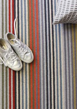 Margo Selby Make Me A Rug: Margo Selby Stripe Frolic Westbrook (1921) with Stripes Thick Borders Black (6203) outer and Cotton Borders Pink (1030) inner border (Double piping) lifestyle shot 4